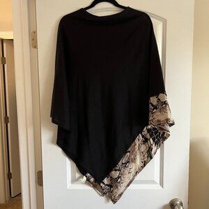 Black poncho shawl with snakeskin hem
